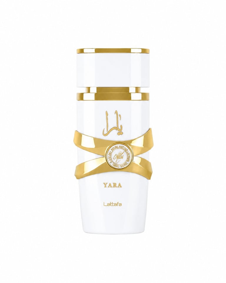 White and gold luxury perfume bottle with bow detail and decorative compass emblem, Yara by Lattafa