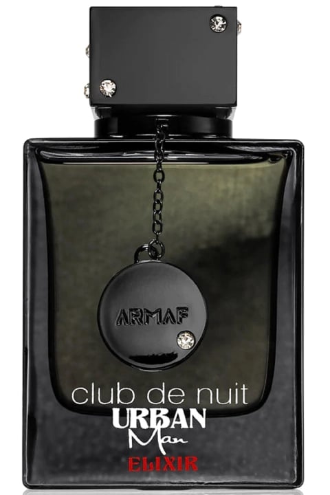 Armaf Club de Nuit Urban Man Elixir perfume bottle with dark glass, decorative pendant charm, and jeweled details
