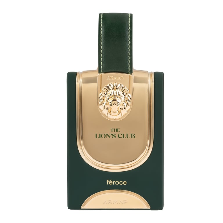 The Lions Club Féroce perfume bottle with gold front plate and green leather case